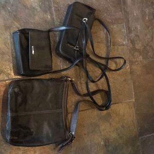 Assorted black leather purses